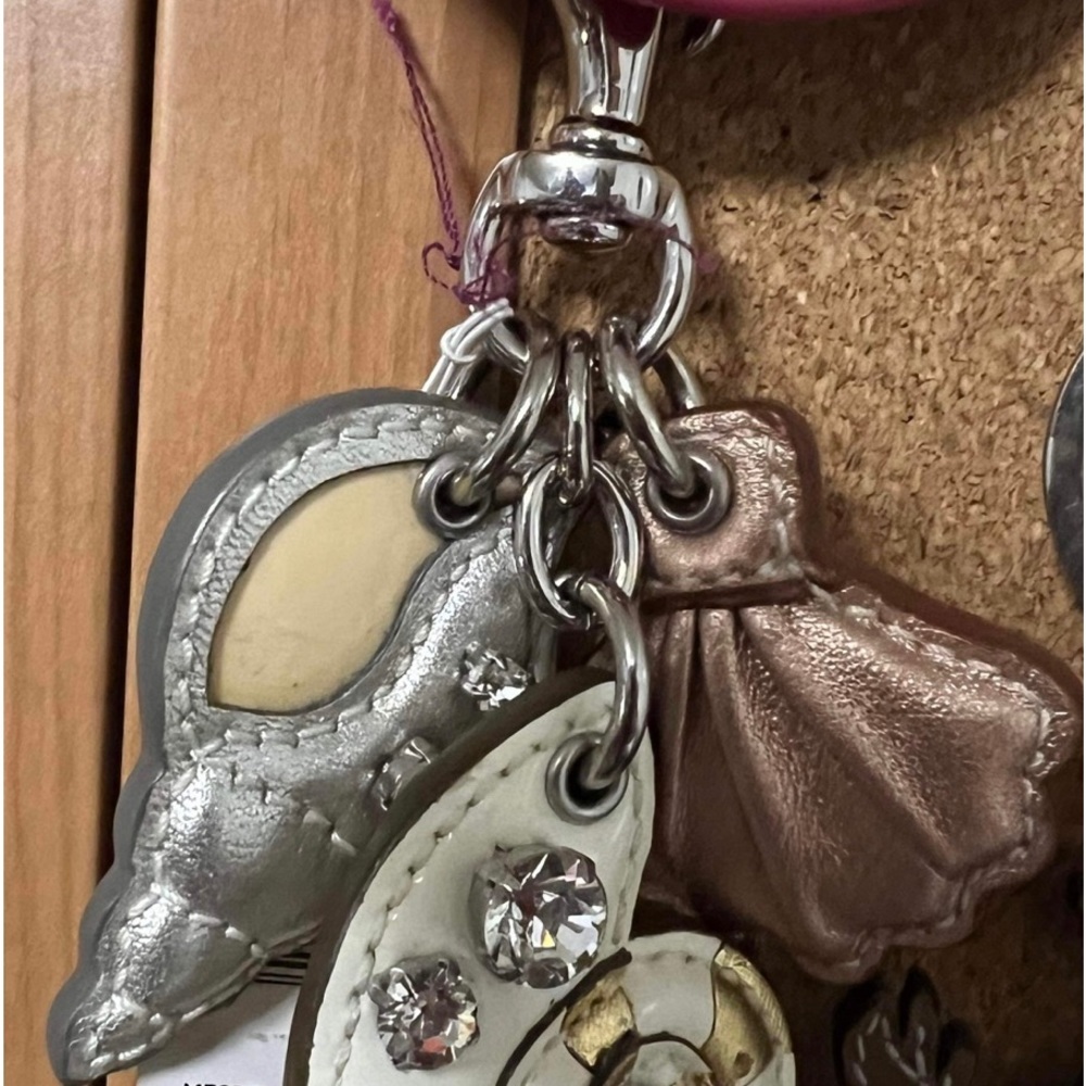Coach Seashell fob with crystal stones